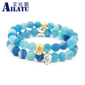 Ювелирные изделия высокого качества Ailatu Оптом, Оникс синего цвета 8 мм, Выветривающийся Камень с позолоченными латунными браслетами в виде черепа
